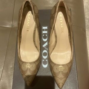 Coach pumps. Never worn. 3.5 inches